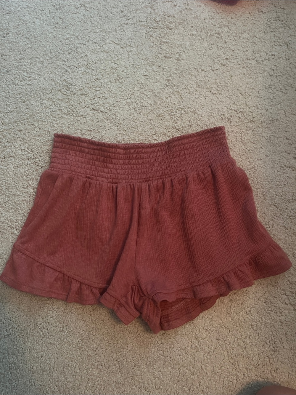 Crave Fame Rust Smocked Waist Ruffle Hem Shorts
